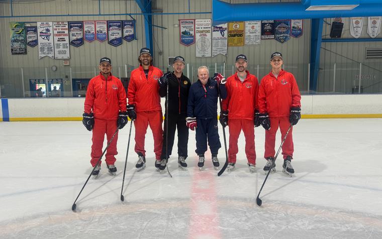 The O-Town Hockey Camp coaching staff on the ice